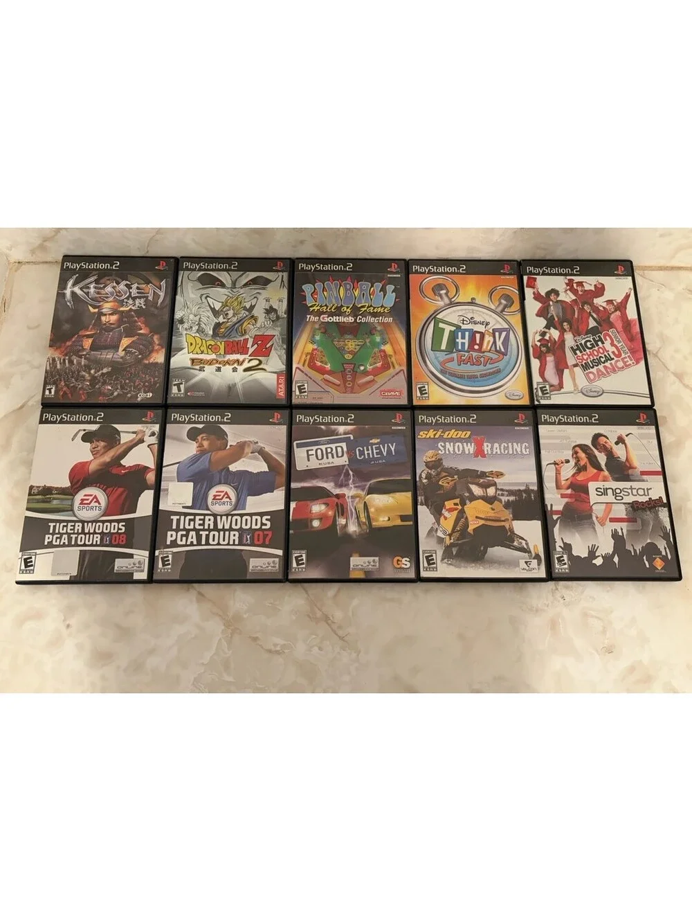 Sony PlayStation 2 Bundle (Console, 20 PS2 Games, Controllers, Multitap) TESTED